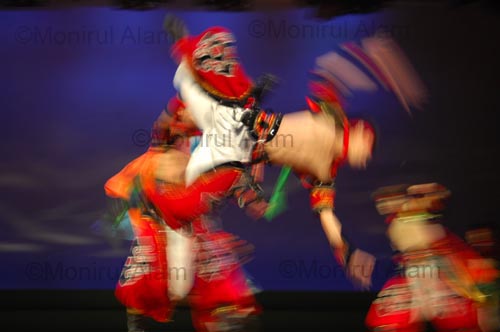 DHAKA. Sep.2009 Inner Mongolia performs their traditional dance. The eagle is a symbol of valour. Copyright Monirul Alam