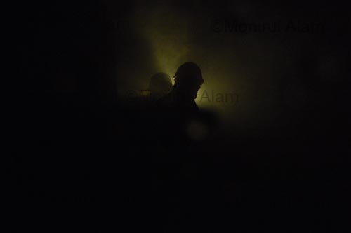 Old Dhaka. October. 2009. Fire fighter in action. ©Monirul Alam